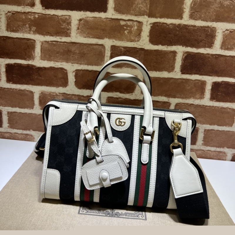 G*u*i top handle bags